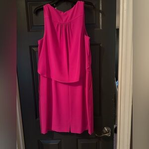 Ladies pink sleeveless dress with pockets. Pleated in back